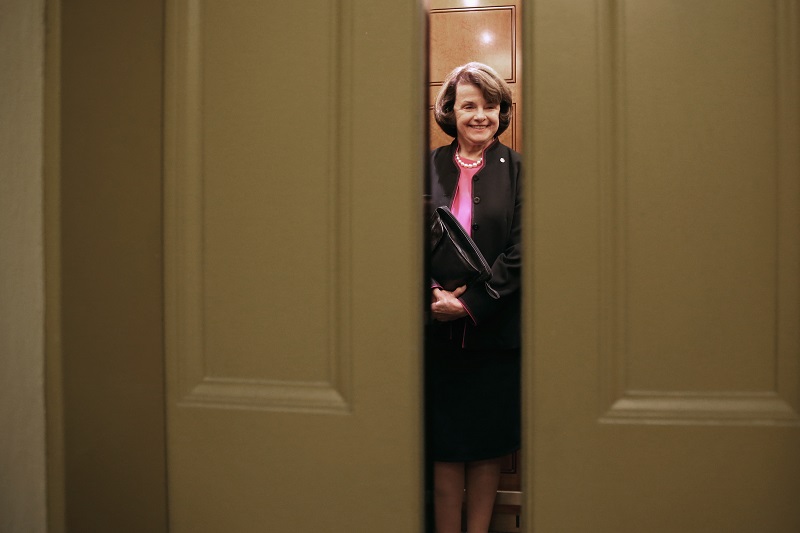 Dianne Feinstein takes an elevator
