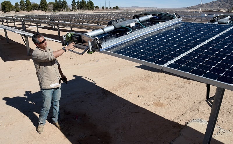 A green energy worker with equipment