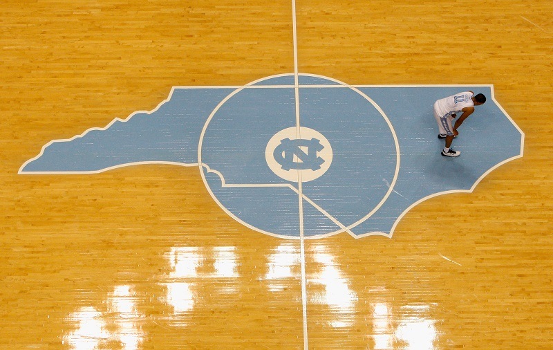 The North Carolina state profile on the floor of the UNC basketball arena