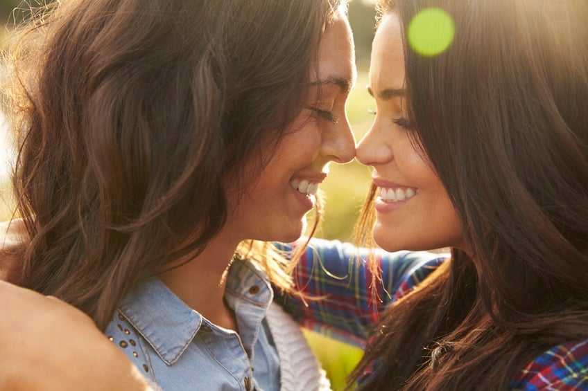Lesbian couple touching noses