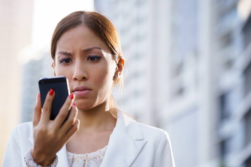 Businesswoman using mobile phone