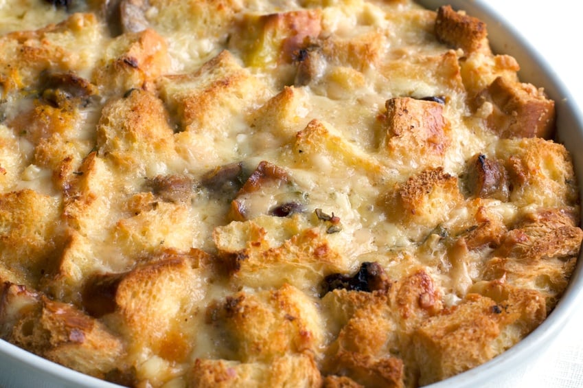 golden melted cheese and savory bread pudding