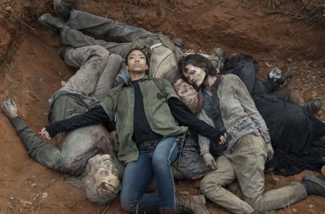 Sasha lying in a pile of dead bodies on The Walking Dead Sasha lying in a pile of dead bodies on The Walking Dead