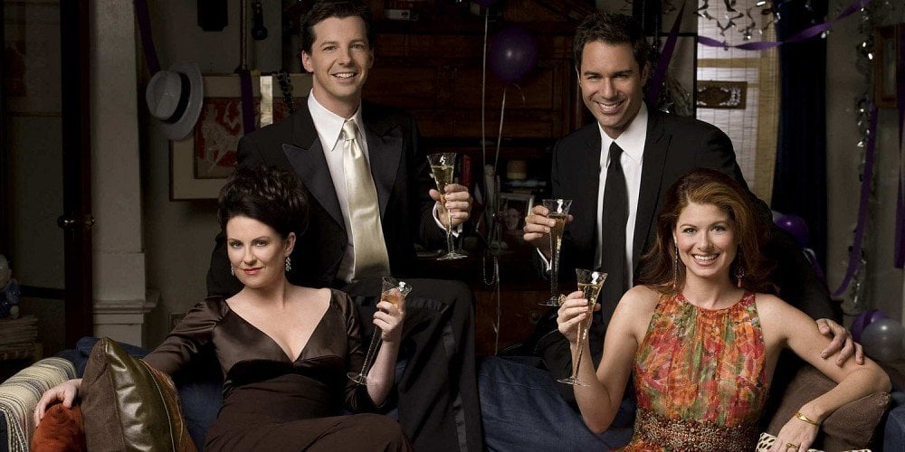 Will and Grace cast pose while holding champagne flutes Will and Grace cast pose while holding champagne flutes