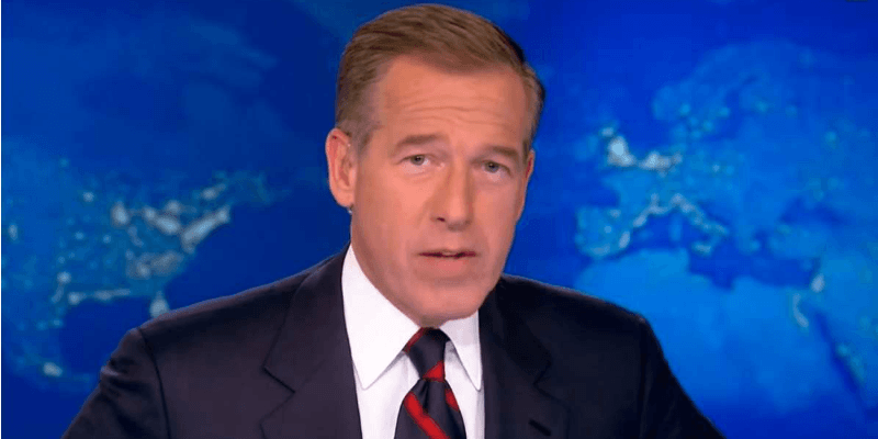 Brian Williams speaking behind a news desk. Brian Williams speaking behind a news desk.
