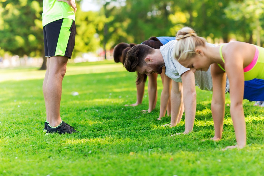 group of friends or sportsmen exercising