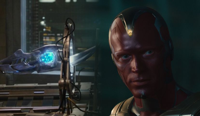  Vision stands next to Loki's scepter 