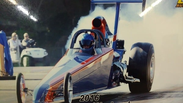 2015 American Dragster burning out before a race