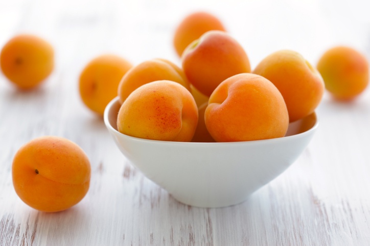 ceramic bowl filled with apricots