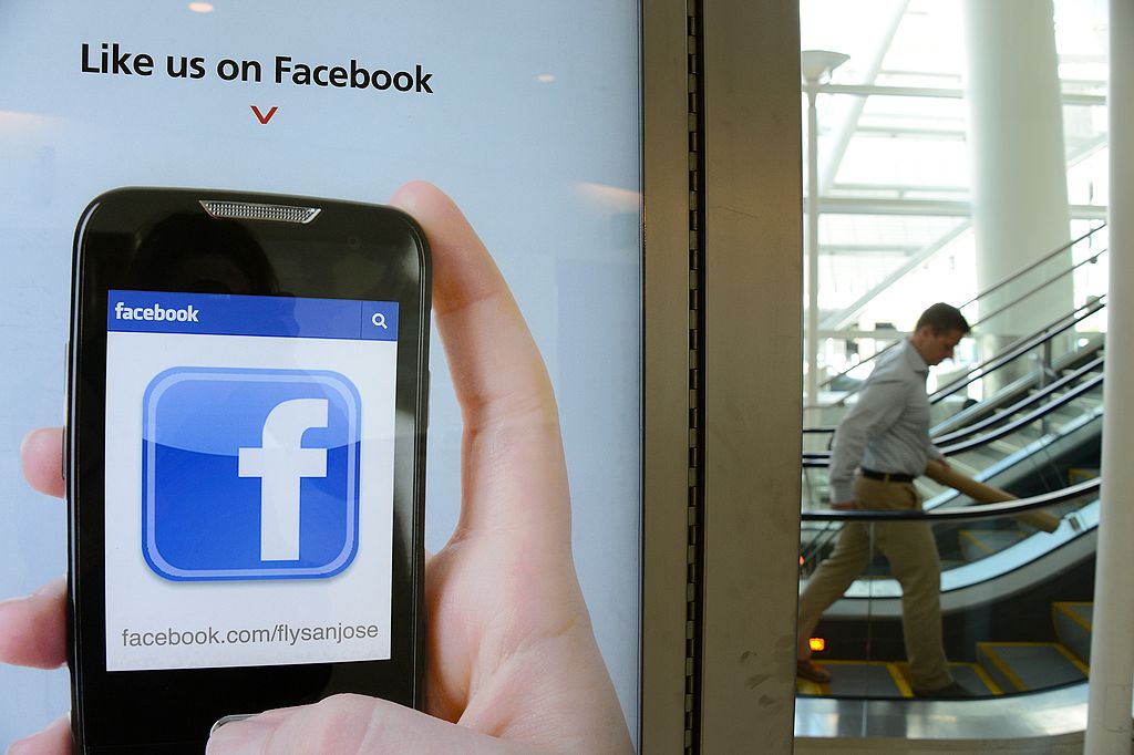 An advertisement for San Jose International Airport suggests to users to "like" the airport's Facebook page
