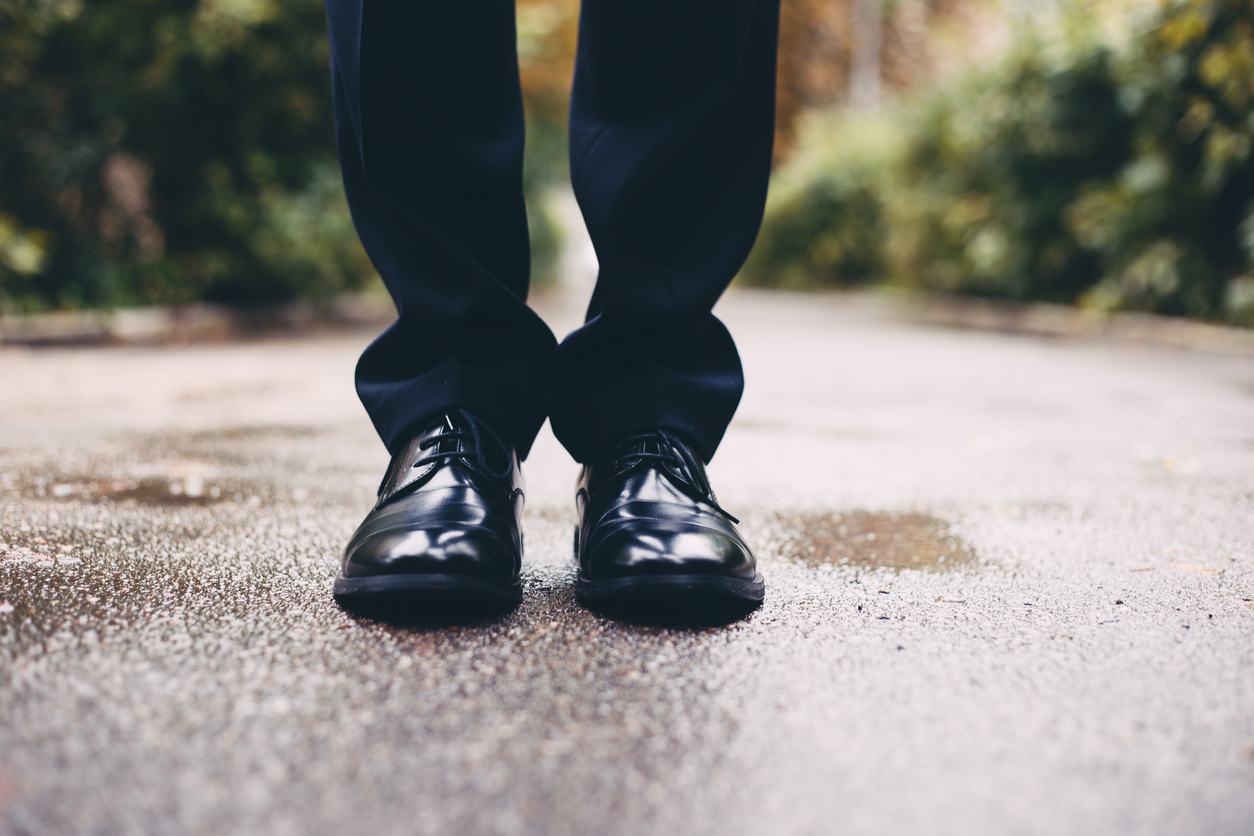 Black shoes of the groom