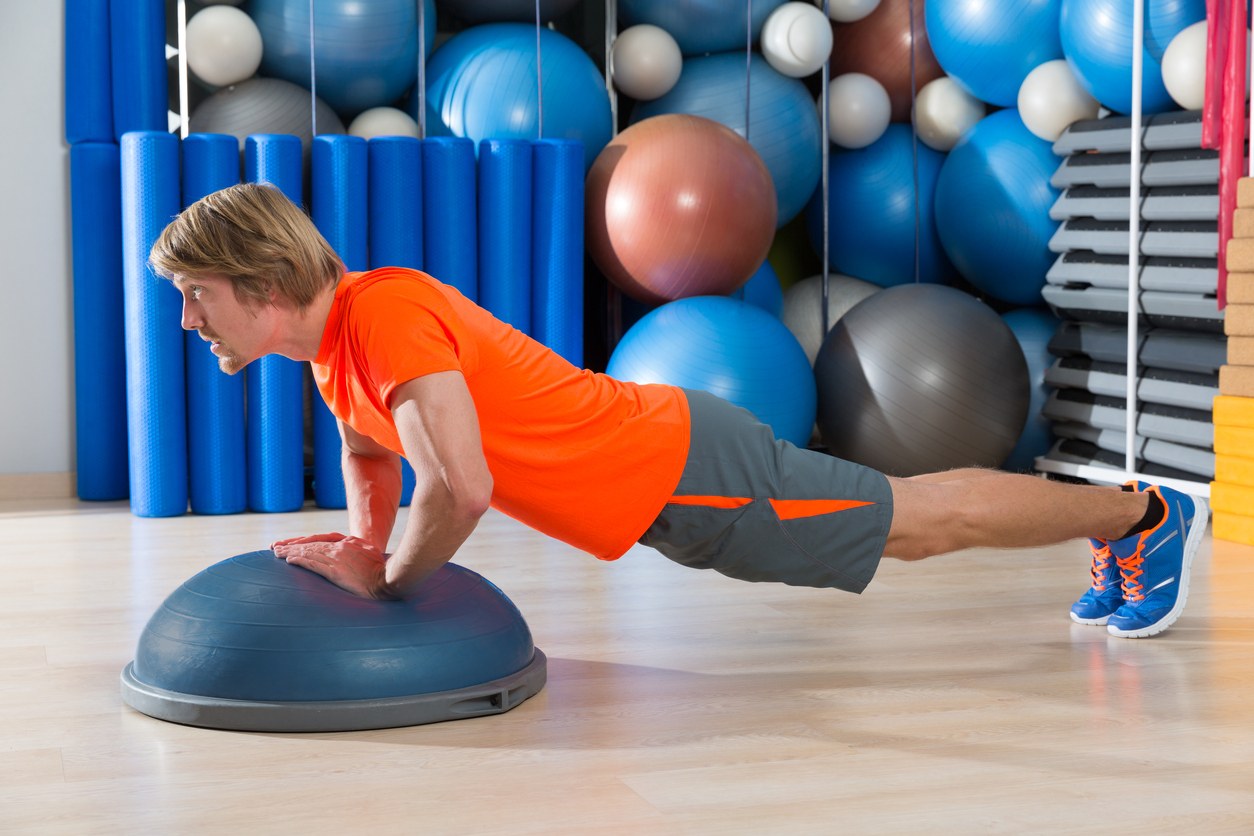 A man demonstrates a diamond pushup