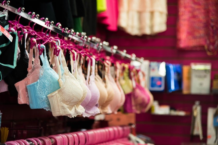 colorful bras on hangers