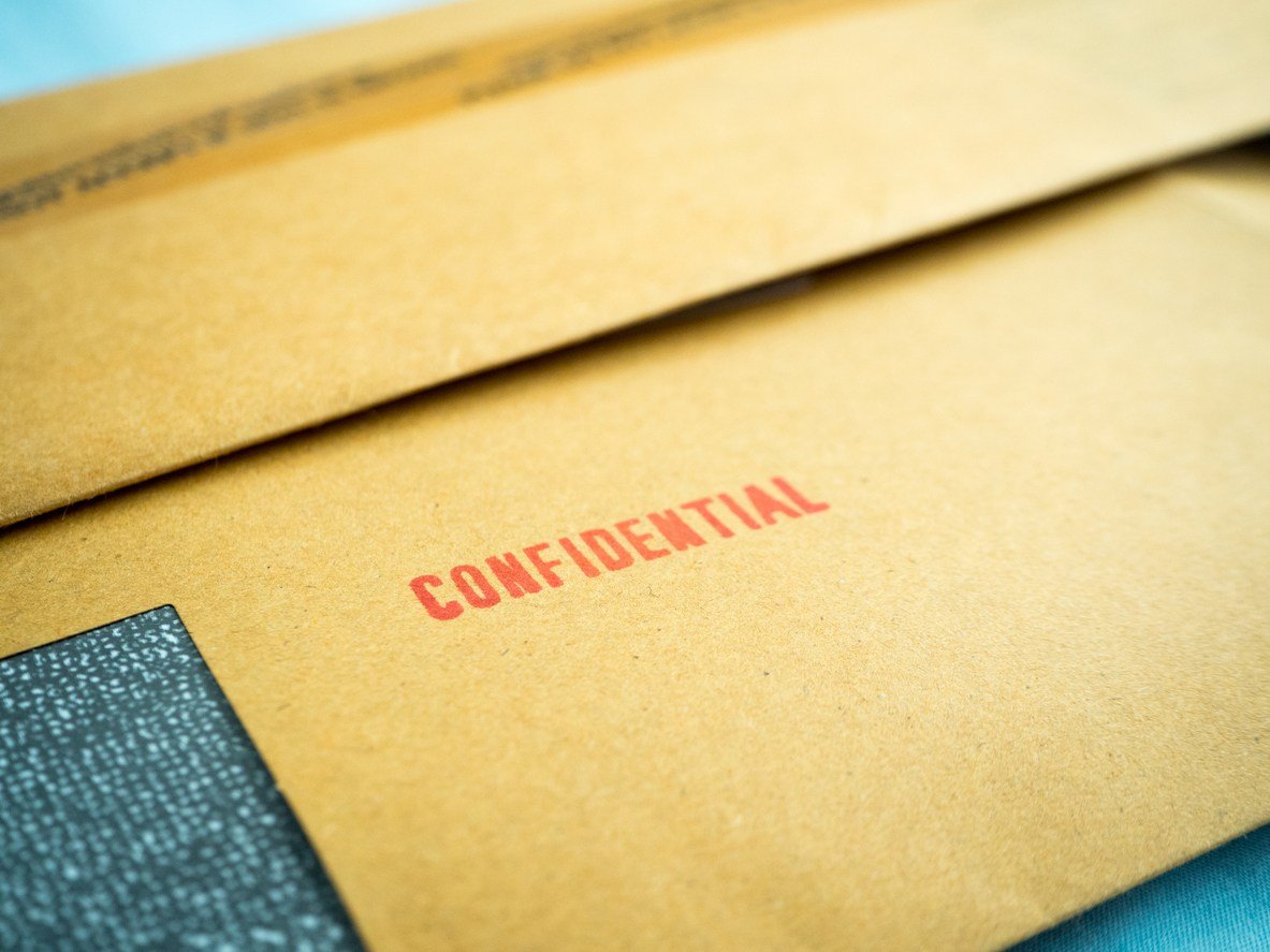 "Confidential" printed on brown vintage envelope