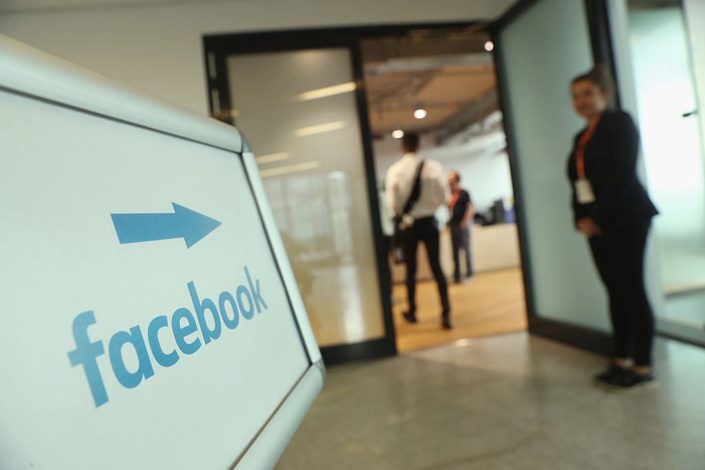 A sign points to the Berlin Facebook offices