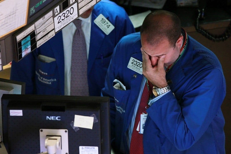 A trader works on the floor of the New York Stock Exchange