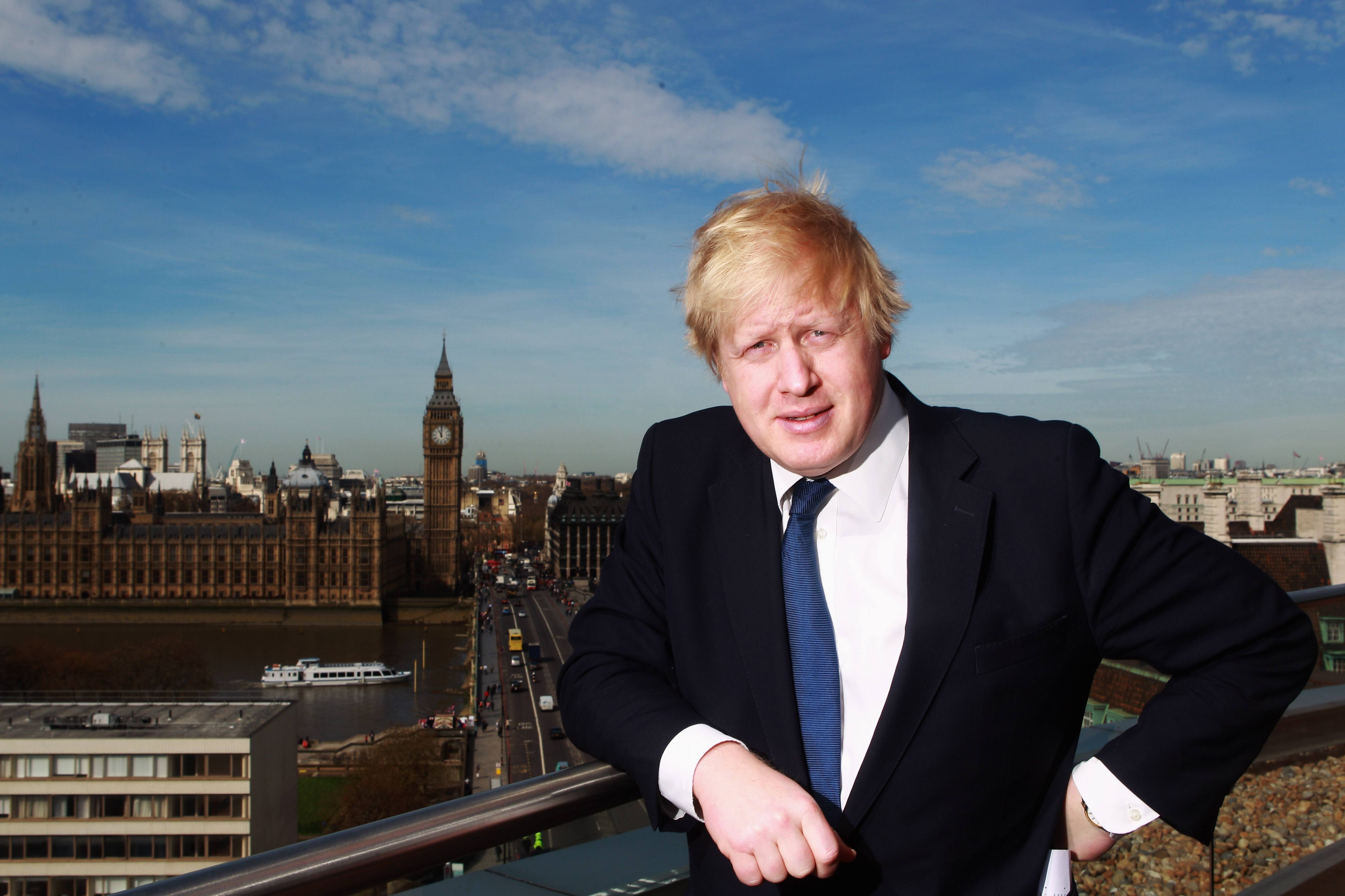 Boris Johnson poses for a photo