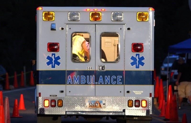 An ambulance is seen driving off