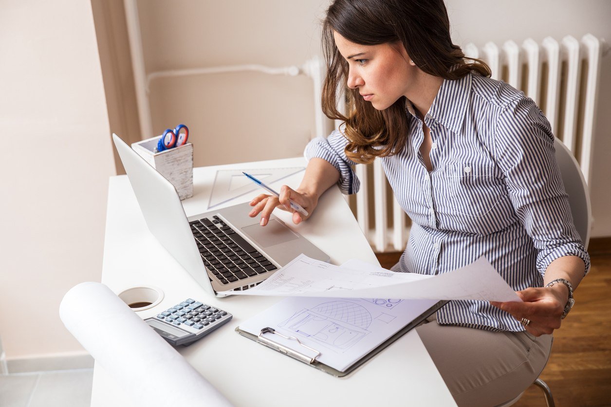 young woman using laptop