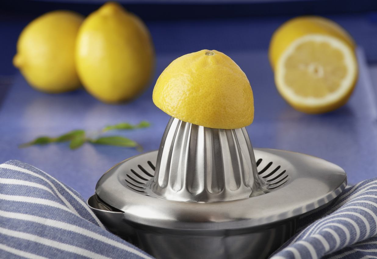 lemon on steel lemon juicer