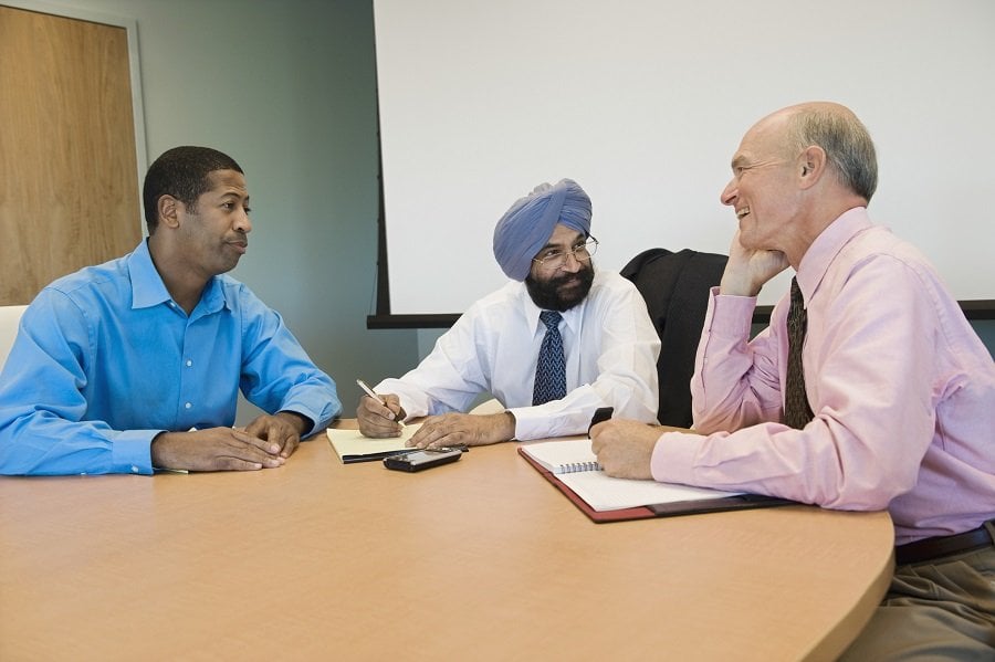 group of co-workers talking