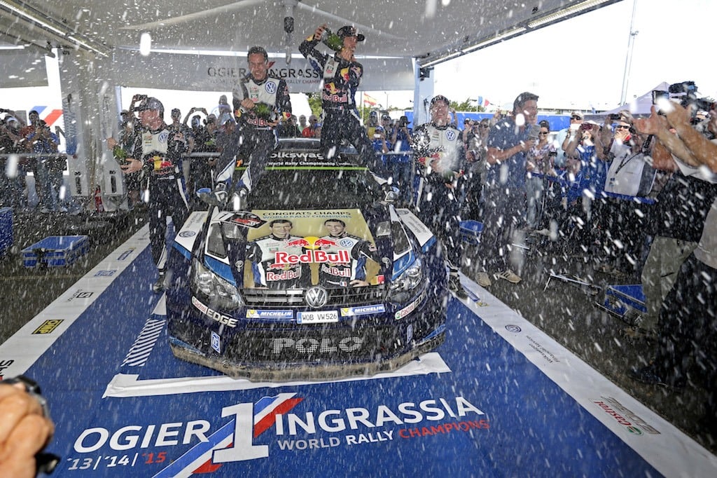 Miikka Anttila (FIN), Julien Ingrassia (F), Sebastien Ogier (F), Jari-Matti Latvala (FIN) celebrate during the FIA World Rally Championship 2015 | Volkswagen Motorsport/Red Bull Content Pool