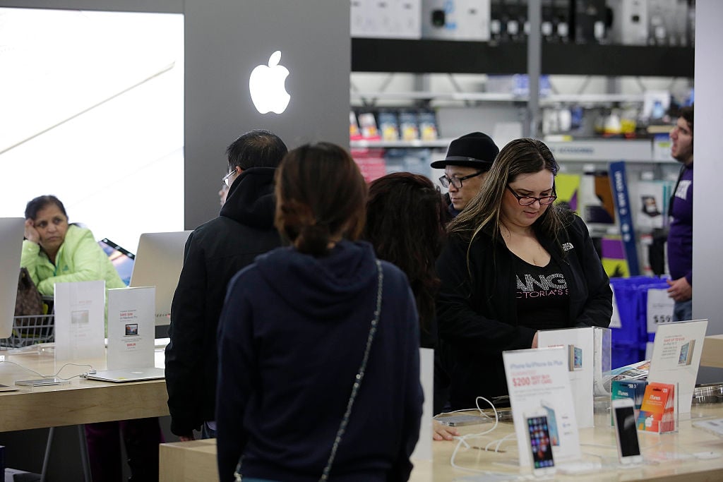 Customers shop for electronics and other items at a Best Buy