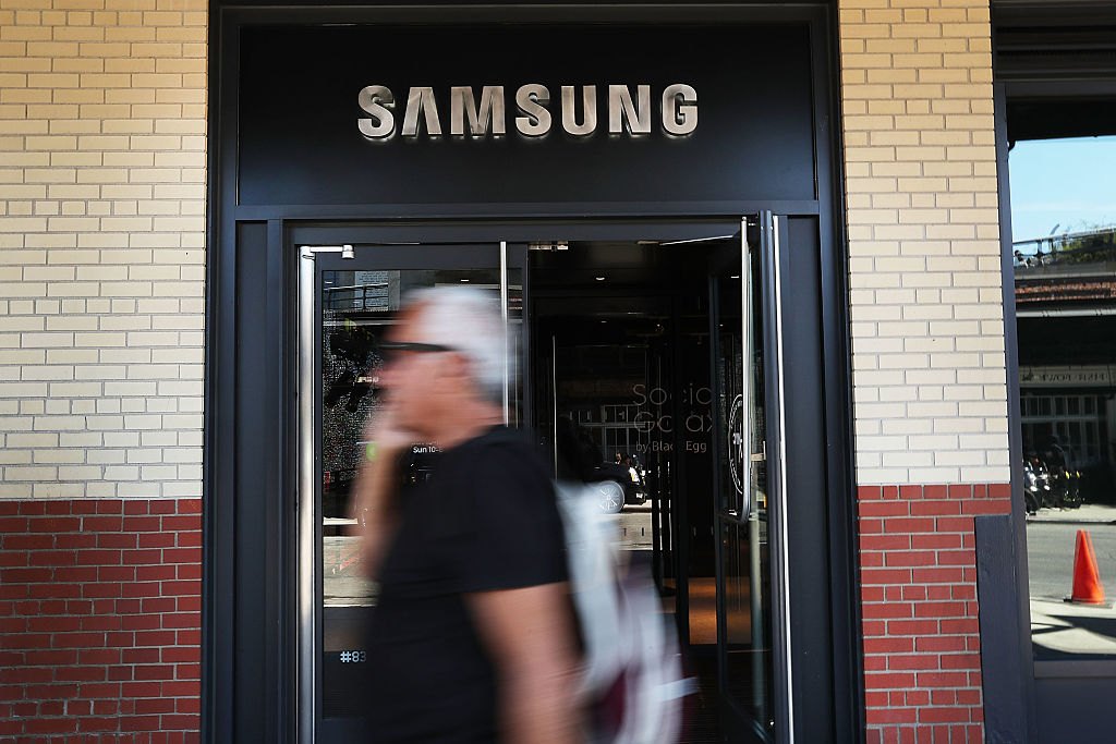 People walk by the new Samsung store in lower Manhattan