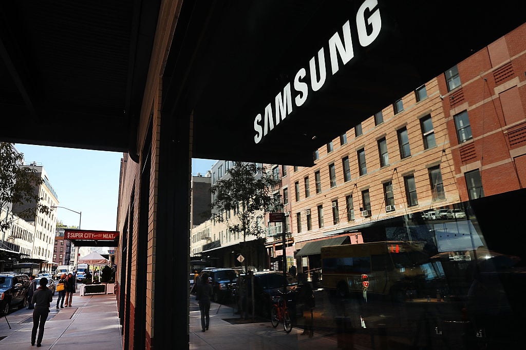 People walk by the new Samsung store in lower Manhattan on October 11, 2016 in New York City