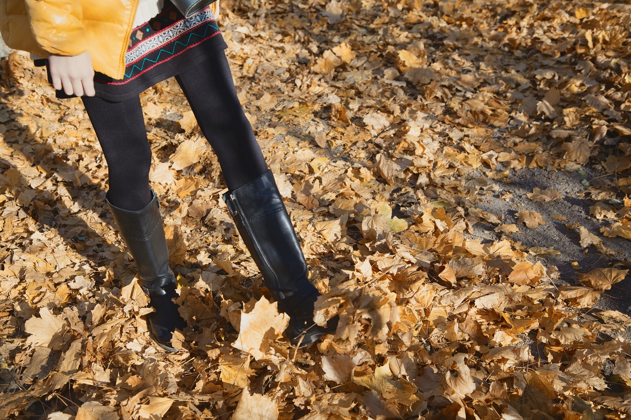 Slender legs of a teenage girl