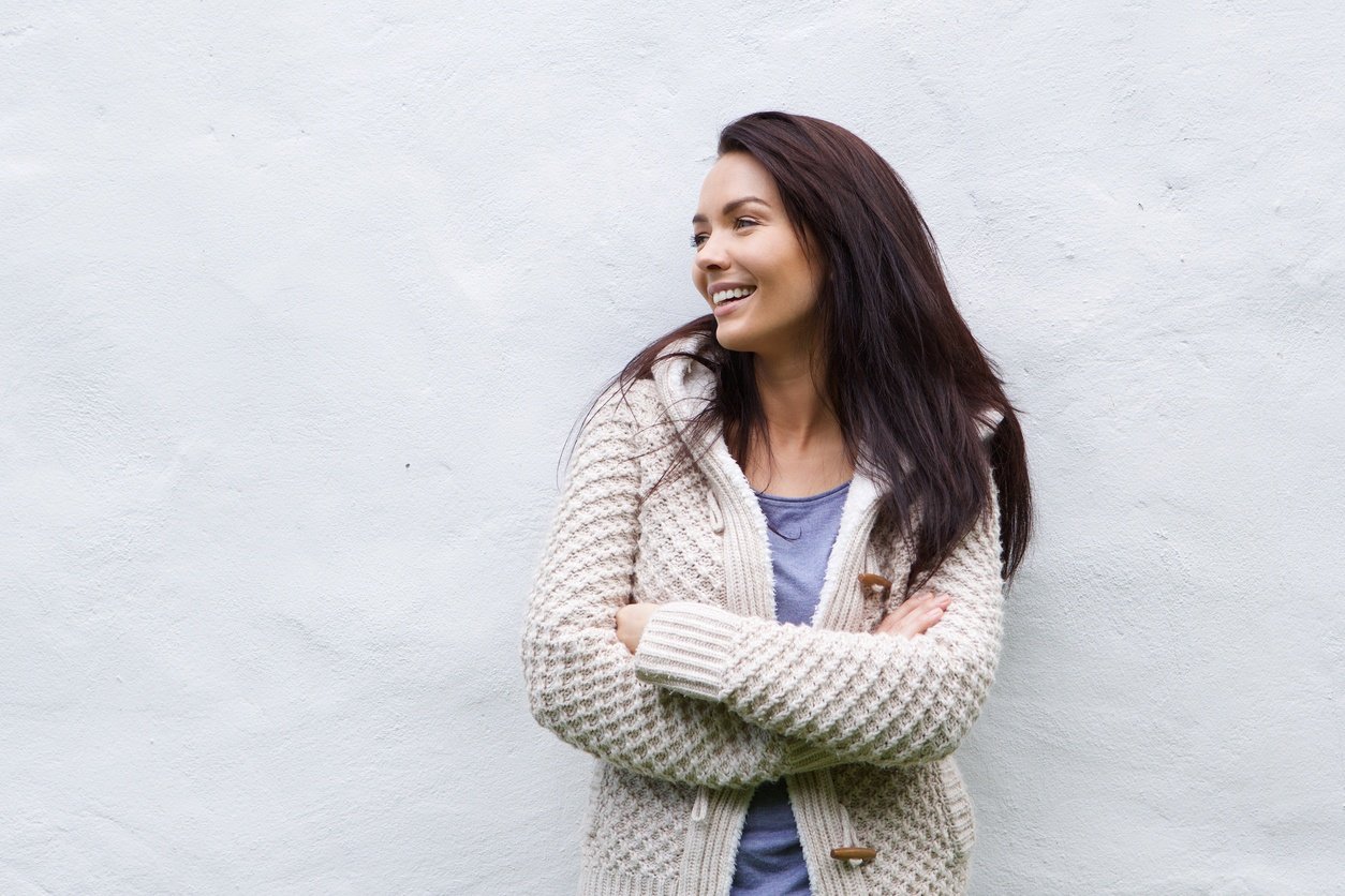 smiling woman in wool sweater