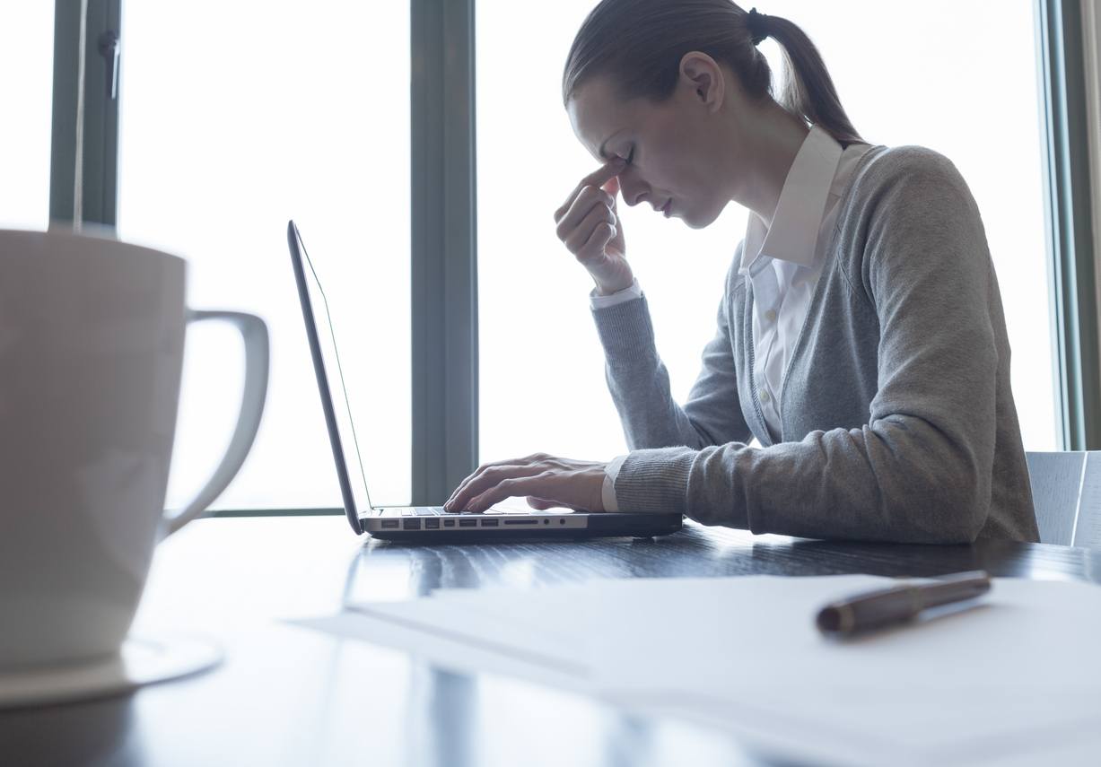 Stressed business woman in the office