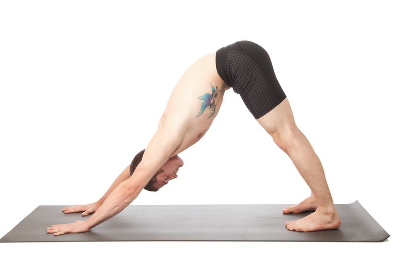 Man doing the downward facing dog position