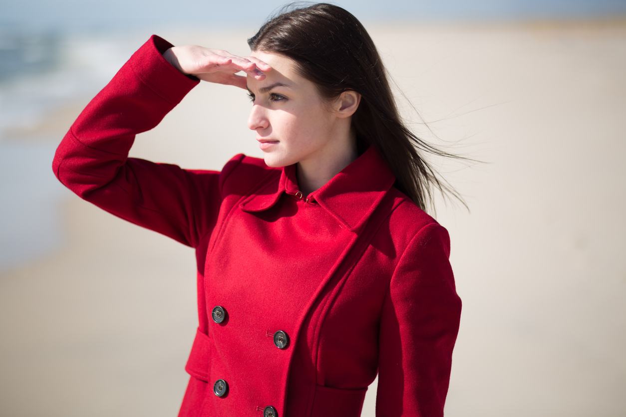 woman looking at the ocean