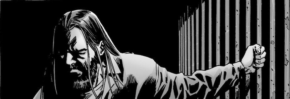 Negan in jail. Imprisoned in Alexandria, Negan grips the bars to his prison cell in 'The Walking Dead' comics.