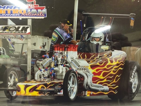 32 Spitzer Bantam with a flame paint job getting ready to race