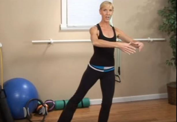 Woman demonstrates how to perform a standing lift