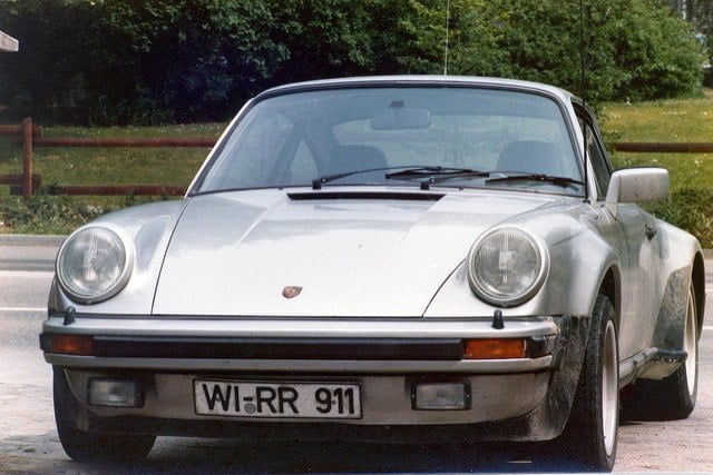 A silver 1975 Porsche 911 S.