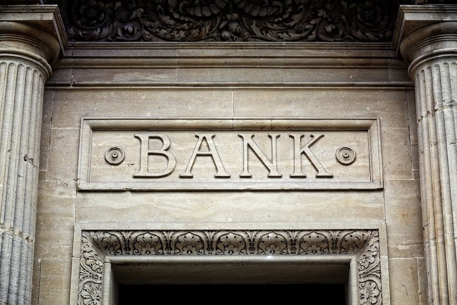 Old bank sign carved in stone