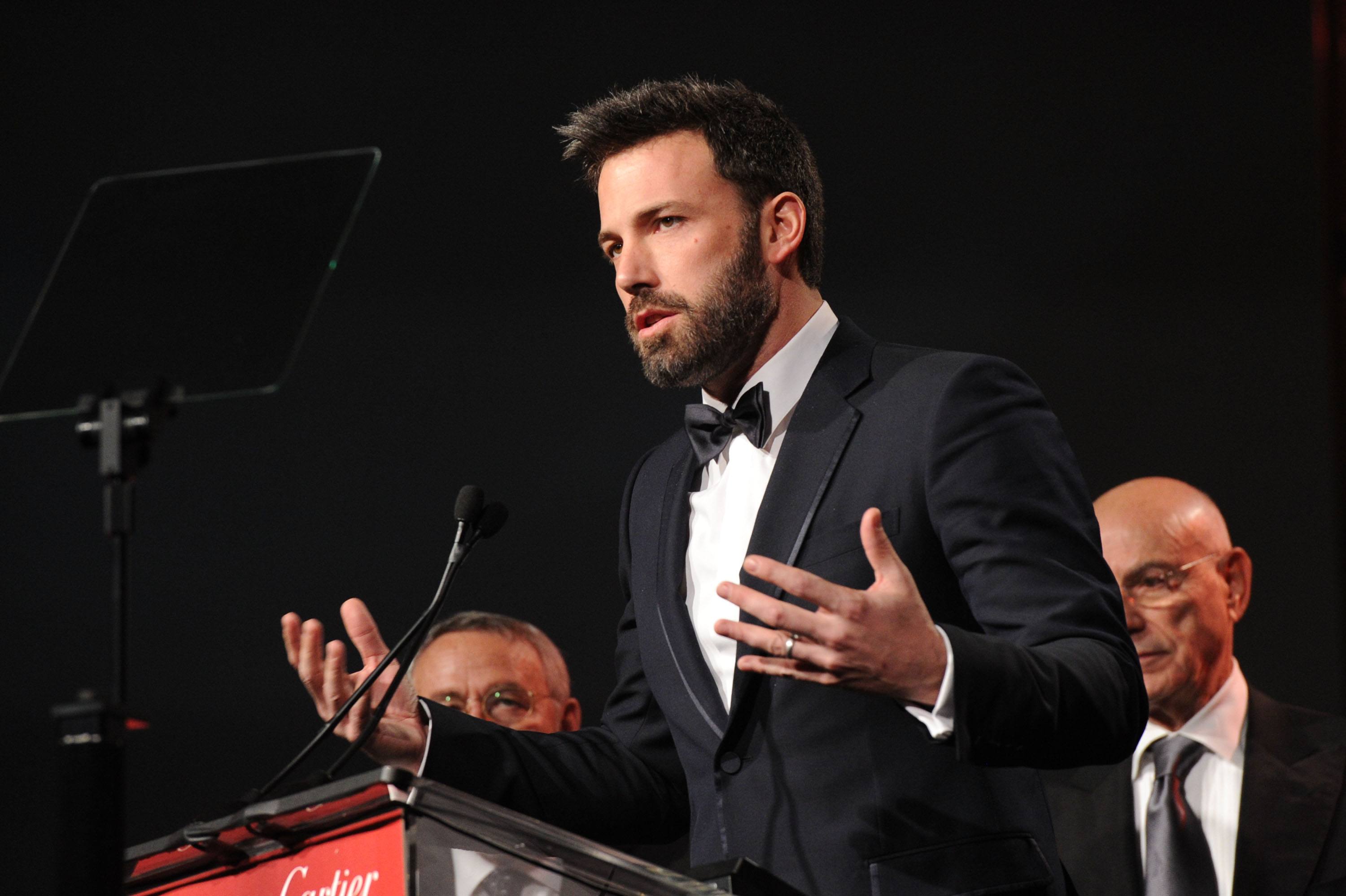 Actor Ben Affleck accepts the Ensemble Performance Award