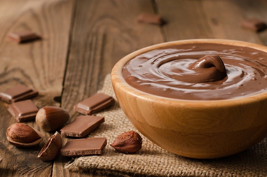 chocolate sauce in a bowl on jute