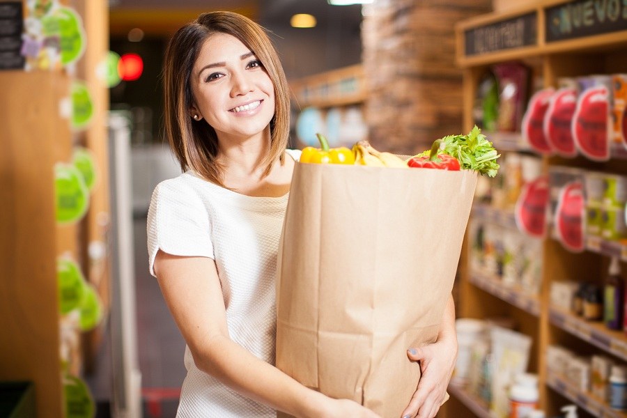 young woman carrying a shopping bag