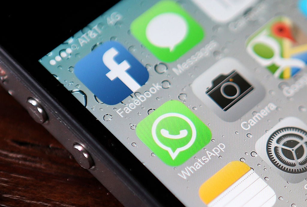 App icons are displayed on an iPhone