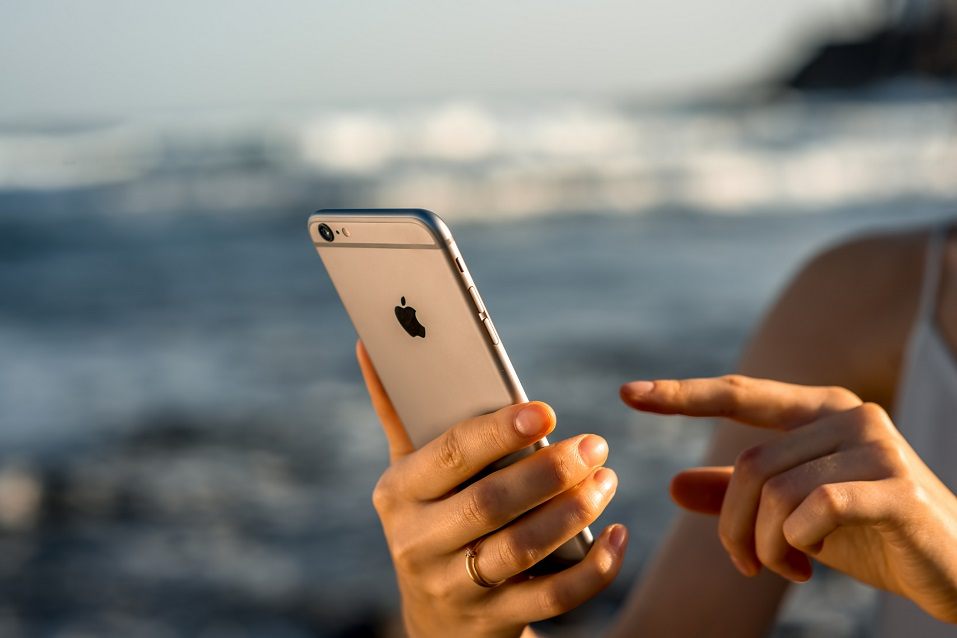Female hands holding new iPhone 6s