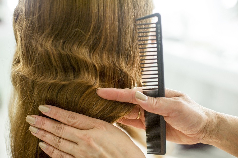 woman getting finger waves in her hair