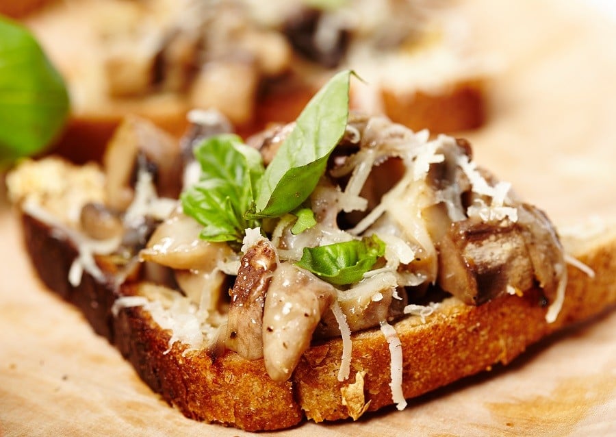 mushroom bruschettas decorated with leaves