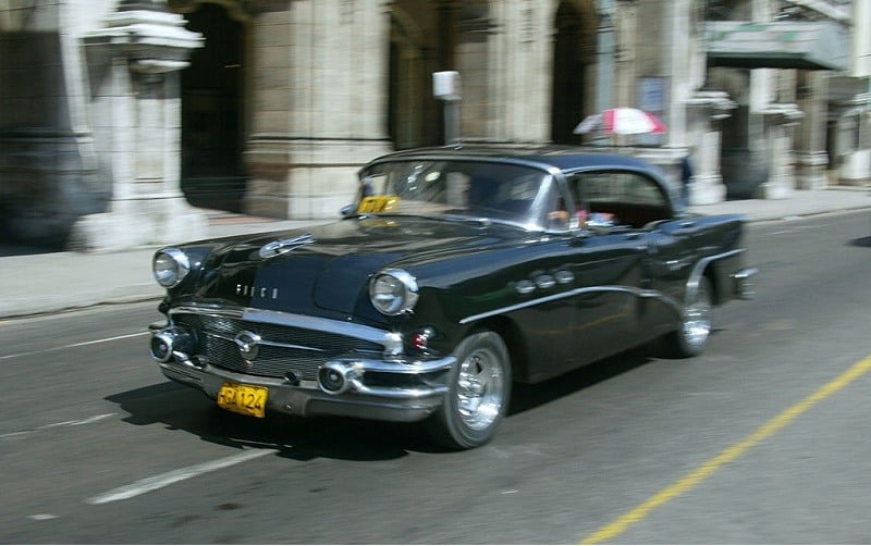 Picture taken 06 May 2004 downtown Havana of a 1950's Buick, an American classic car. Cars are probably the most valuable luxury items in Cuba, not to mention a necessity for some, and the skills and resources necessary to maintain a car not only provides the best job, but having such skills considered a well-kept secret, passed down from father to son through the generations. The Cubans consider the family car, and its clean-running engine, like a Wedding Car Frenchman or Californian thinks of his vineyard. Up until The Revolution in 1960, Cuba was the largest importer of American Cars.