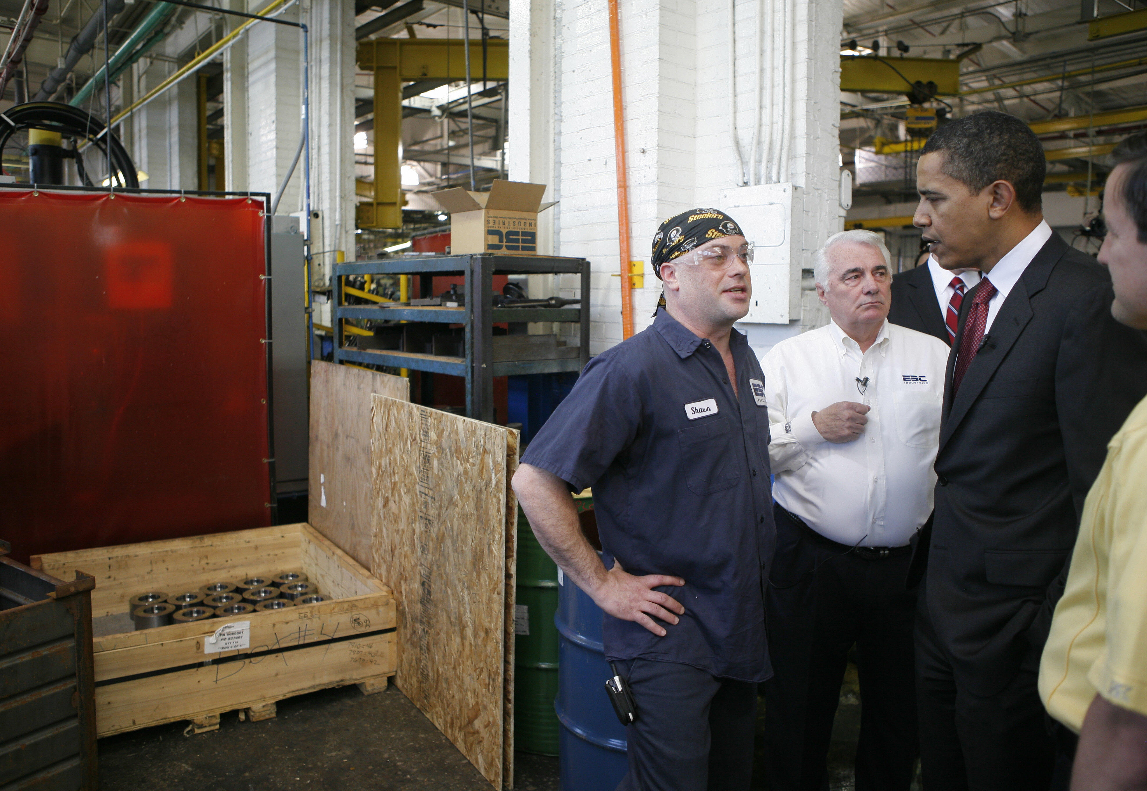 In 2008, then-candidateBarack Obama talks with workers while touring the bolt manufacturer Erie Bolt Company in Erie, Pennsylvania