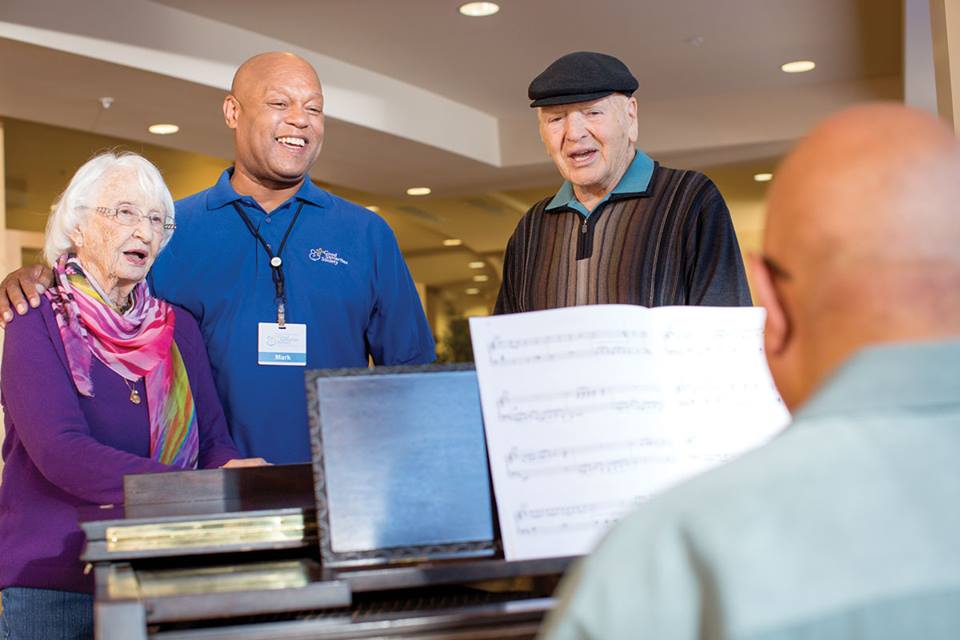 A Good Samaritan Society employee helps an elderly couple