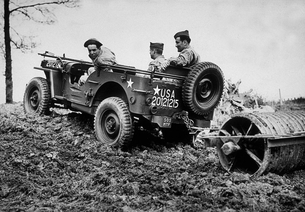 A jeep at work, rolling rough ground